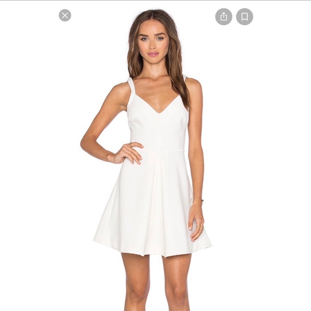 Likely size 2 white dress